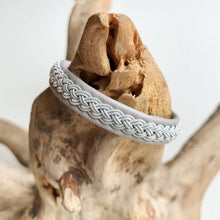 Load image into Gallery viewer, Traditional Sami reindeer leather bracelet with pewter, in BLACKS, GREYS and WHITE.