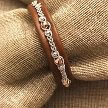 Load image into Gallery viewer, Scandinavian rreindeer leather bracelets with sterling silver beads and rose gold metallic Swarovski crystals. In nougat and navy.