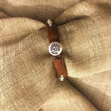 Load image into Gallery viewer, Scandinavian rreindeer leather bracelets with sterling silver beads and rose gold metallic Swarovski crystals. In nougat and navy.