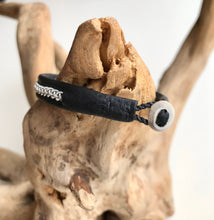 Load image into Gallery viewer, Traditional Sami black reindeer leather bracelets with intricate pewter and an antler button.