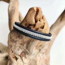 Load image into Gallery viewer, Traditional Sami black reindeer leather bracelets with intricate pewter and an antler button.