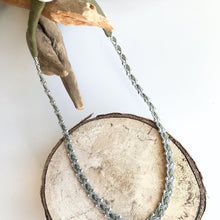 Load image into Gallery viewer, Scandinavian light olive Sami reindeer leather necklace with a full set of sterling silver beads.