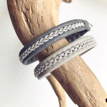 Load image into Gallery viewer, Traditional Lapland Sami reindeer leather bracelet with flat pewter. White, grey and blacks.
