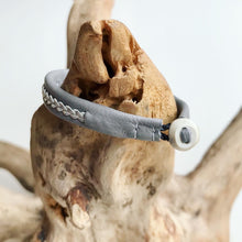 Load image into Gallery viewer, Traditional Lapland Sami reindeer leather bracelet with flat pewter. White, grey and blacks.
