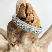 Load image into Gallery viewer, Traditional Sami reindeer leather bracelet with pewter, in BLACKS, GREYS and WHITE.
