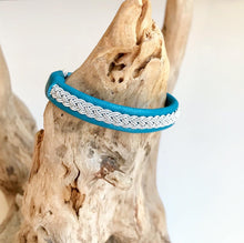 Load image into Gallery viewer, Traditional Sami reindeer leather bracelet with pewter in blues and greens.
