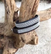 Load image into Gallery viewer, Traditional Swedish Sami reindeer leather bracelets with a braid of flat pewter threads and borders. Black, navy or charcoal - black shimmer.
