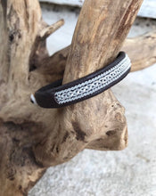 Load image into Gallery viewer, Traditional Swedish Sami reindeer leather bracelets with a braid of flat pewter threads and borders. Black, navy or charcoal - black shimmer.
