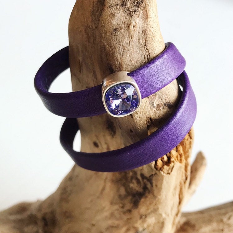 Purple leather bracelets with magnetic clasp and a square purple Swarovski slider.