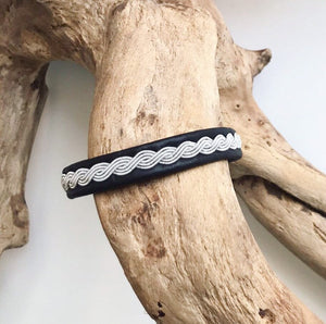 Sami black reindeer leather unisex bracelets, with a wavy pewter braid.