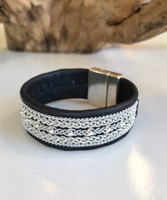 Load image into Gallery viewer, Wide black Scandinavian reindeer leather bracelets, with traditional pewter braiding, sterling silver beads and twisted borders.
