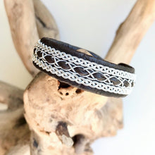 Load image into Gallery viewer, Traditional reindeer leather Sami bracelet, with pewter threads braids and pewter button.
