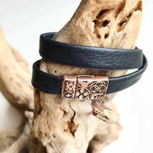 Wrap around black reindeer leather bracelets with an intricate rose gold magnetic clasp.